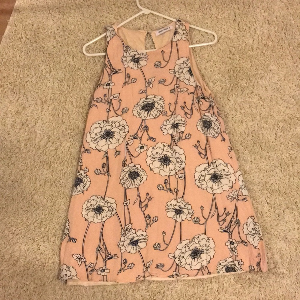 Light pink sleeveless sun dress with flower detail